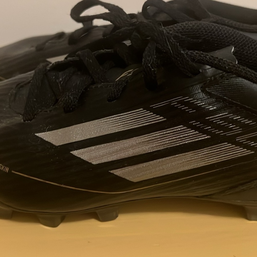 Adidas Boy’s Black and Gold Soccer Cleats